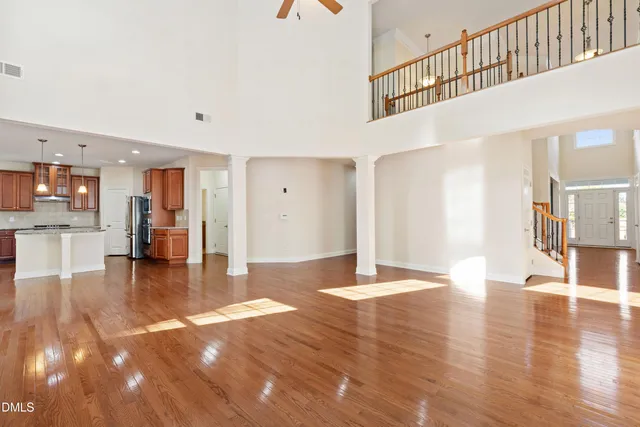 a view of a livingroom with wooden floor