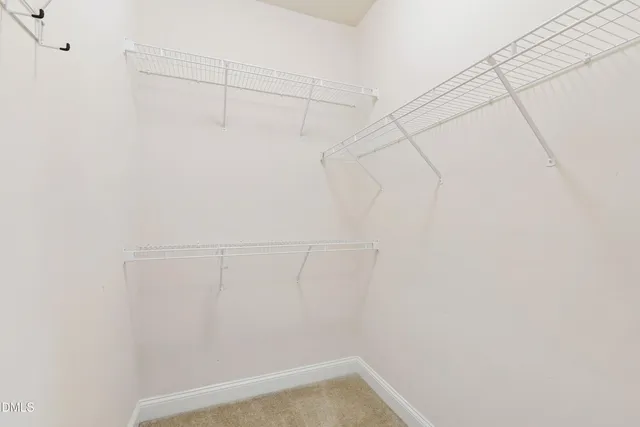 a view of a room with racks on the wall