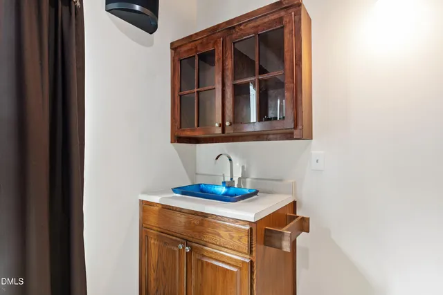 a kitchen with a sink and a stove
