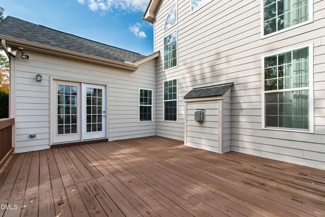 a view of deck with wooden floor and fence