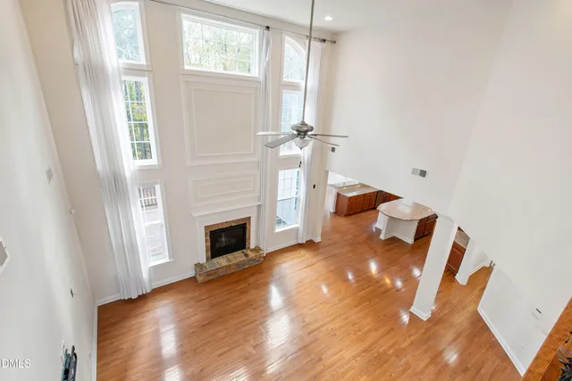 a view of a livingroom with furniture and a fireplace
