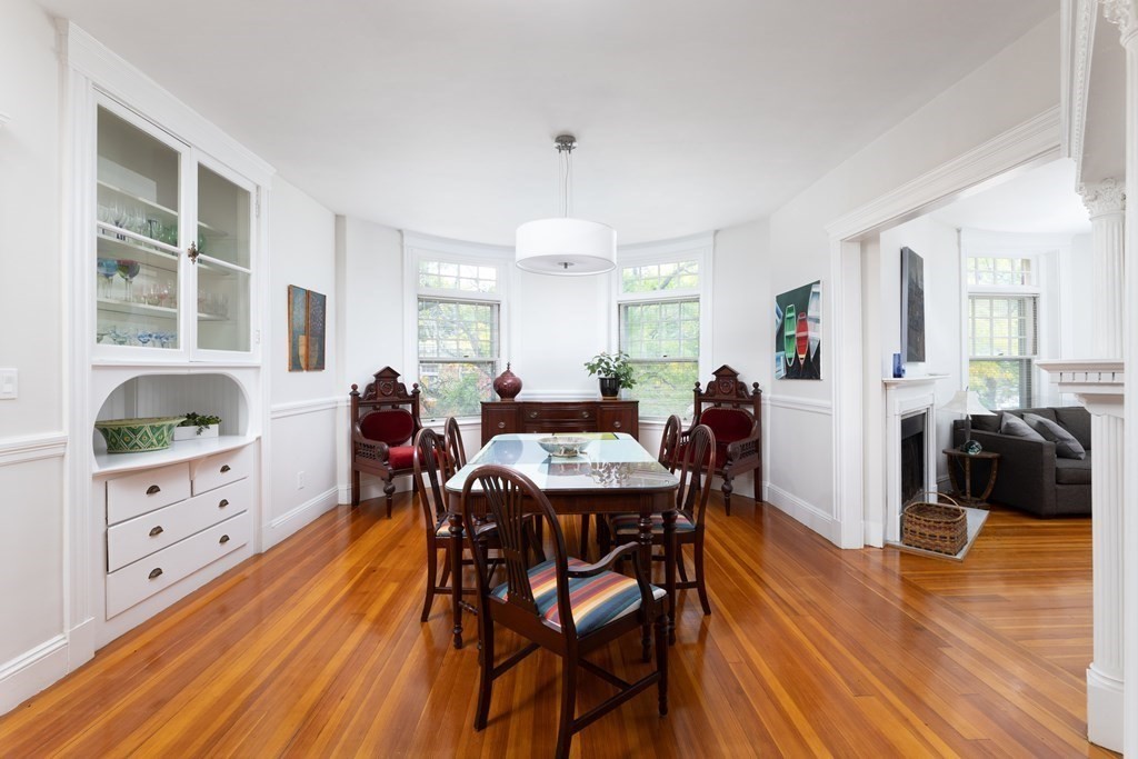 21 Strathmore Road, Unit 3 Brookline, MA 02445 - Photo 2 of 20 a view of a dining room with furniture and wooden floor