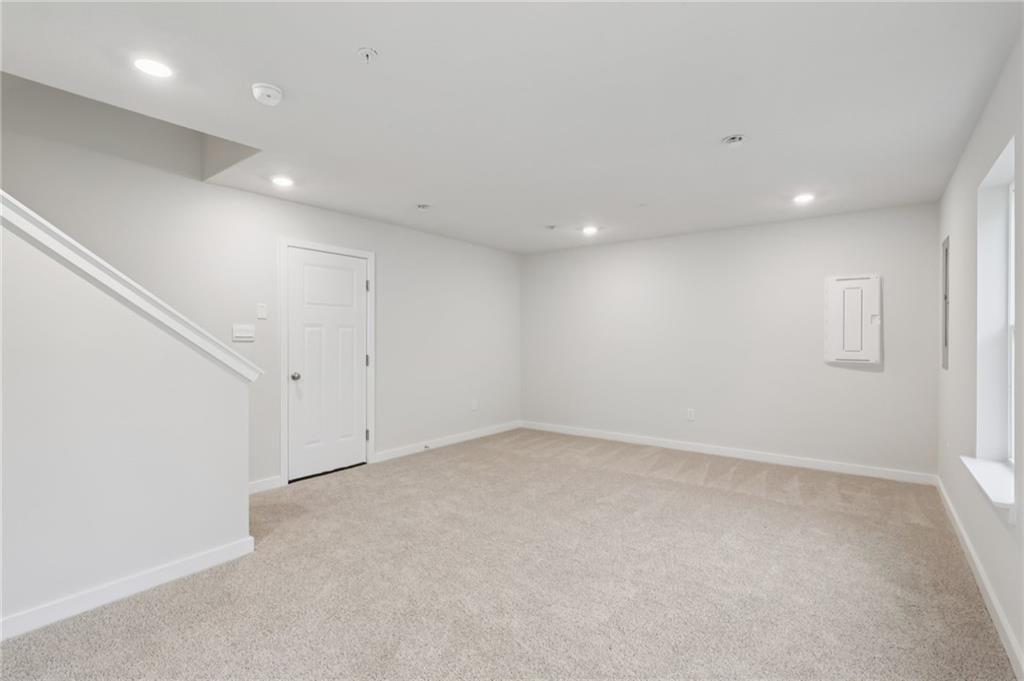 116 River Ridge Drive Coraopolis, PA 15108 - Photo 16 of 27 an empty room with white walls and windows