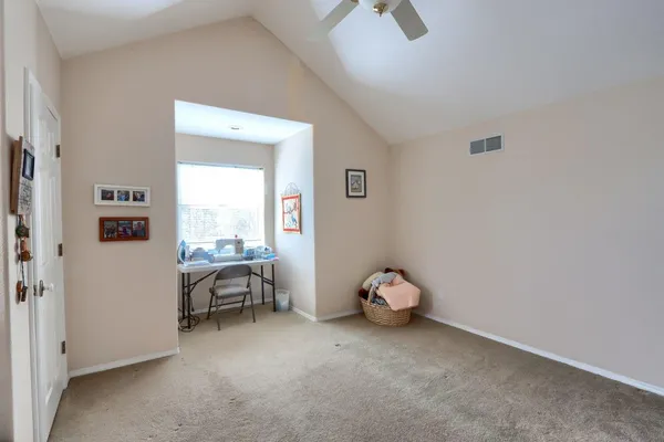 a view of a room with a window