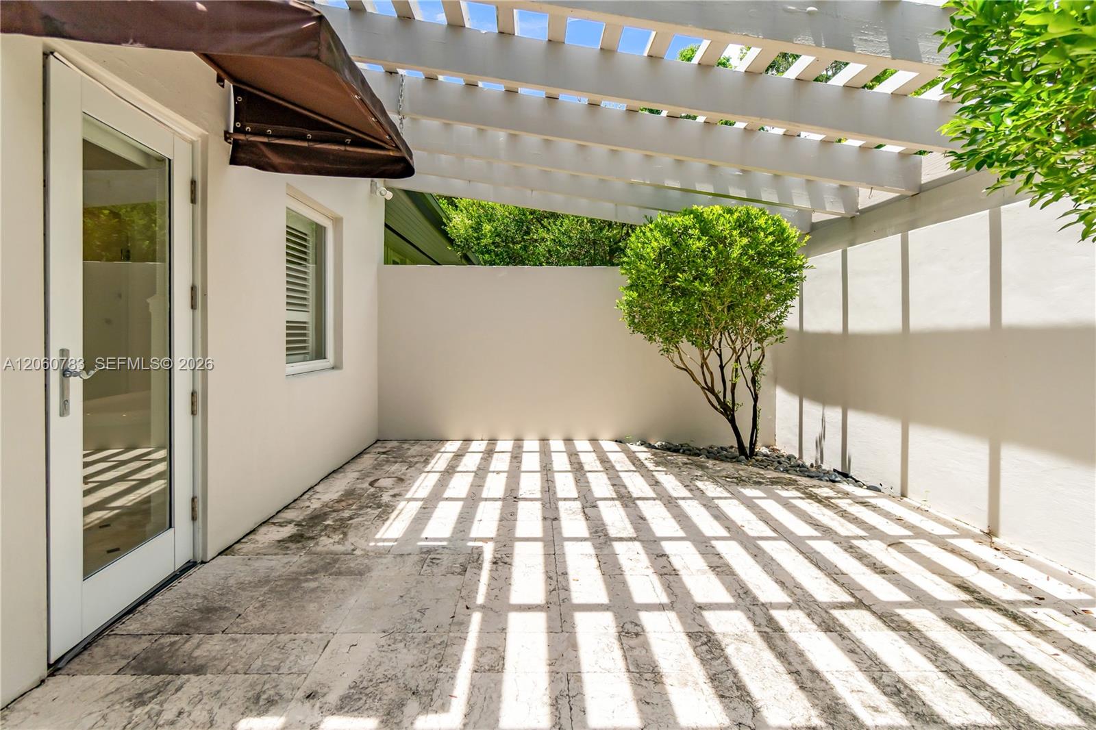 451 Ridge Road Miami, FL 33143 - Photo 48 of 76 Primary bathroom Patio