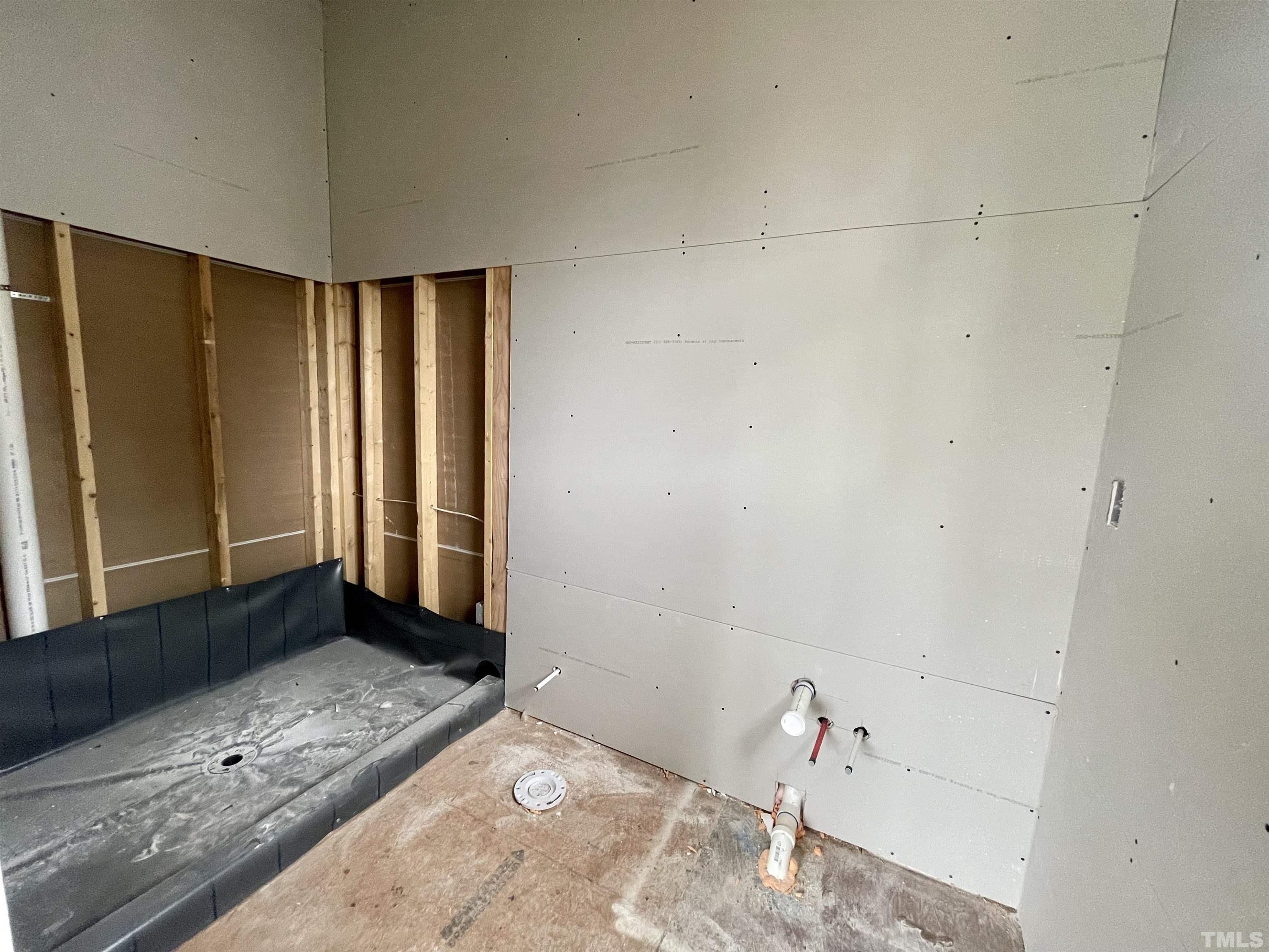 301 Georgetown Road Raleigh, NC 27608 - Photo 23 of 77 a bathroom with a granite countertop sink and a mirror
