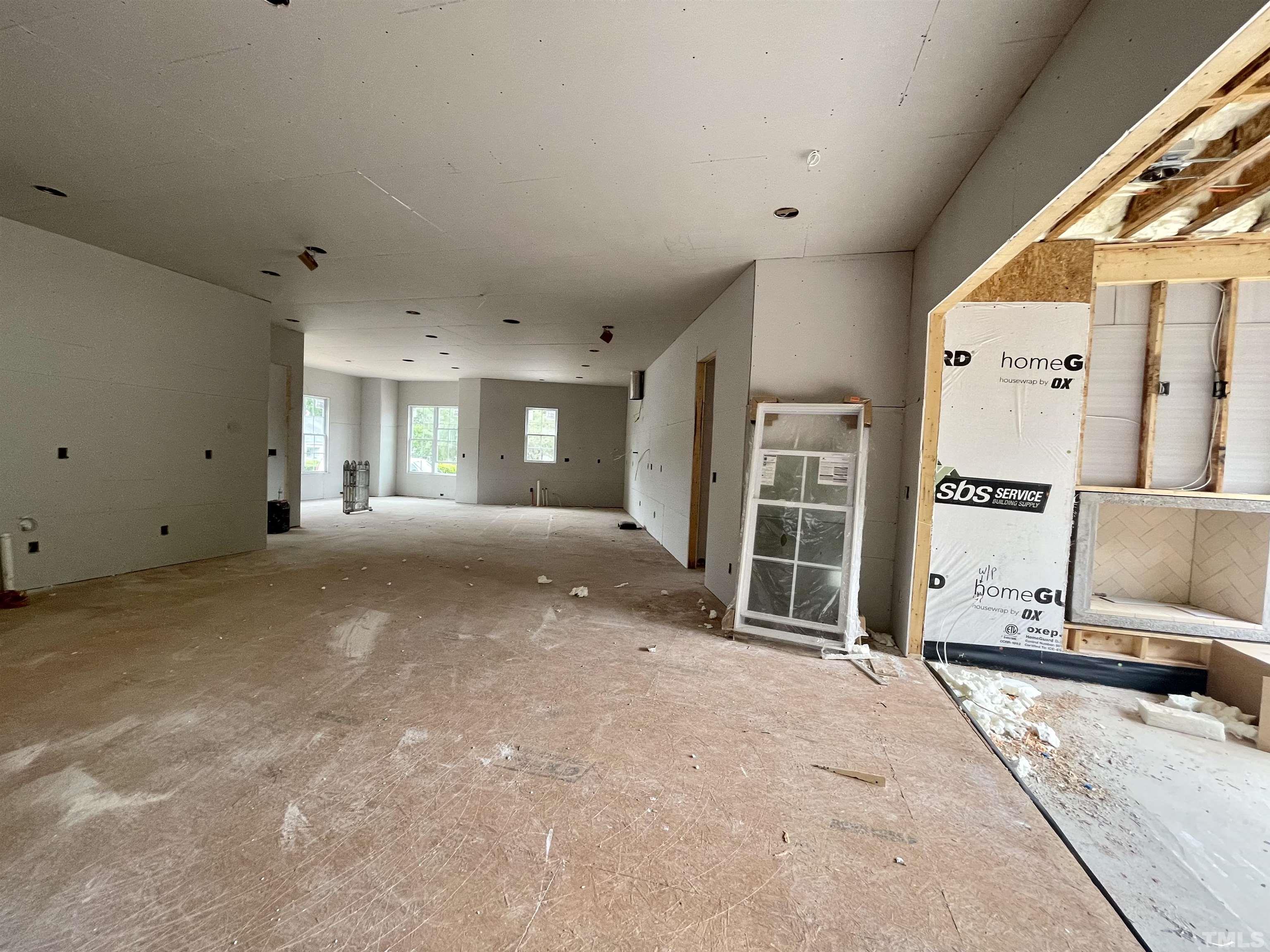 301 Georgetown Road Raleigh, NC 27608 - Photo 30 of 77 a view of livingroom with furniture and windows