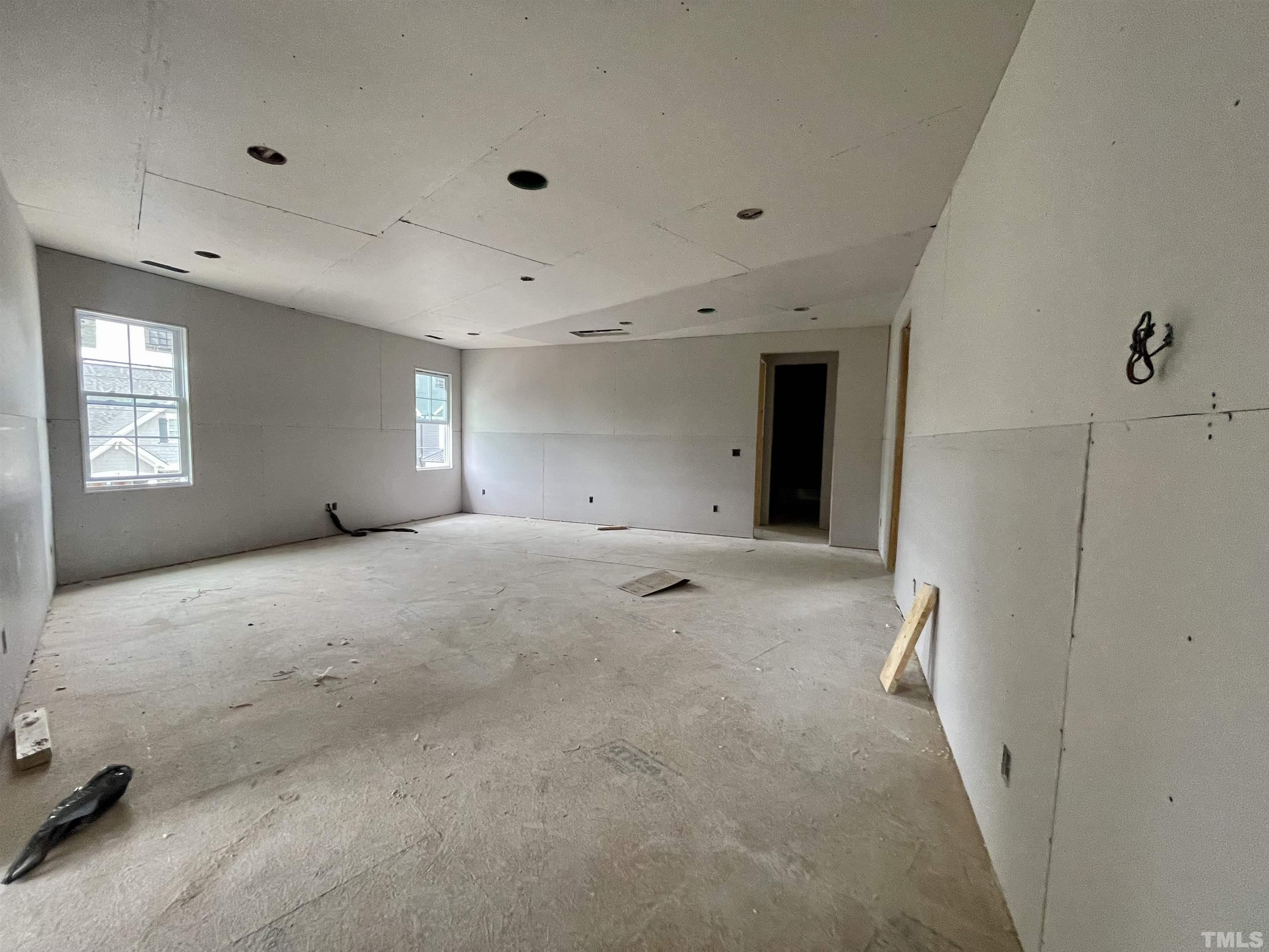 301 Georgetown Road Raleigh, NC 27608 - Photo 32 of 77 a view of a big room with windows and closet