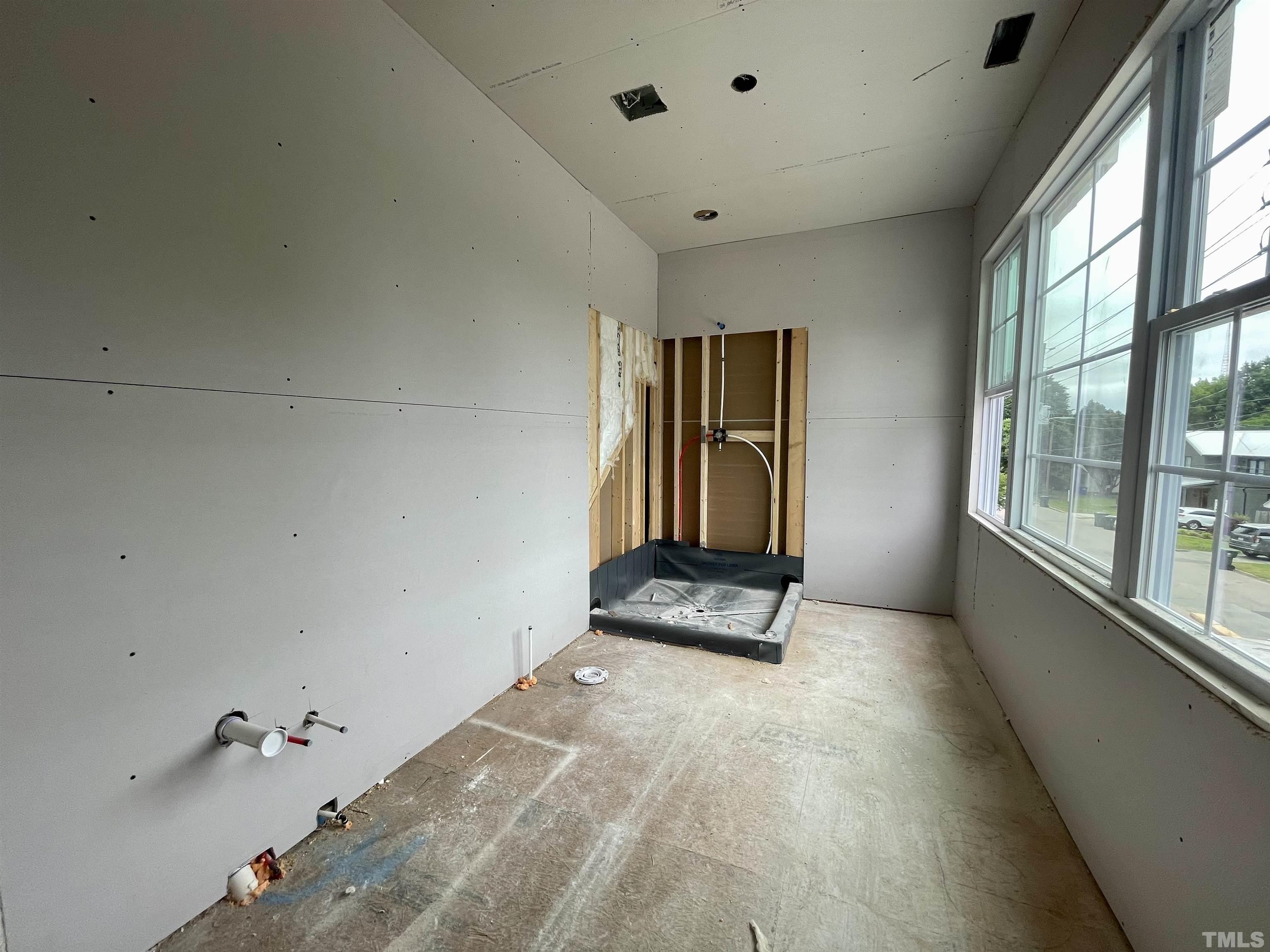 301 Georgetown Road Raleigh, NC 27608 - Photo 34 of 77 wooden floor in an empty room with a window