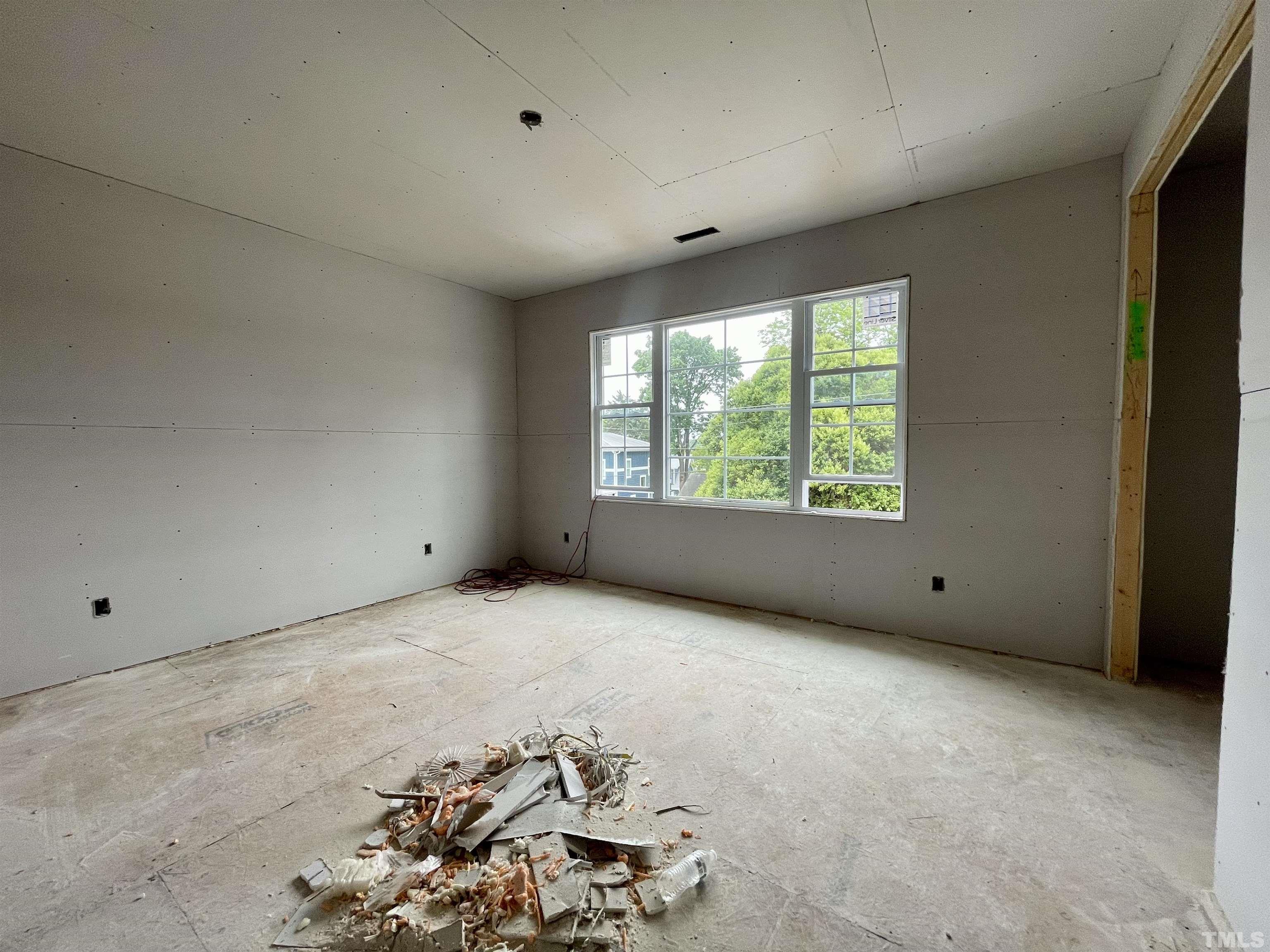 301 Georgetown Road Raleigh, NC 27608 - Photo 35 of 77 a view of an empty room with a window