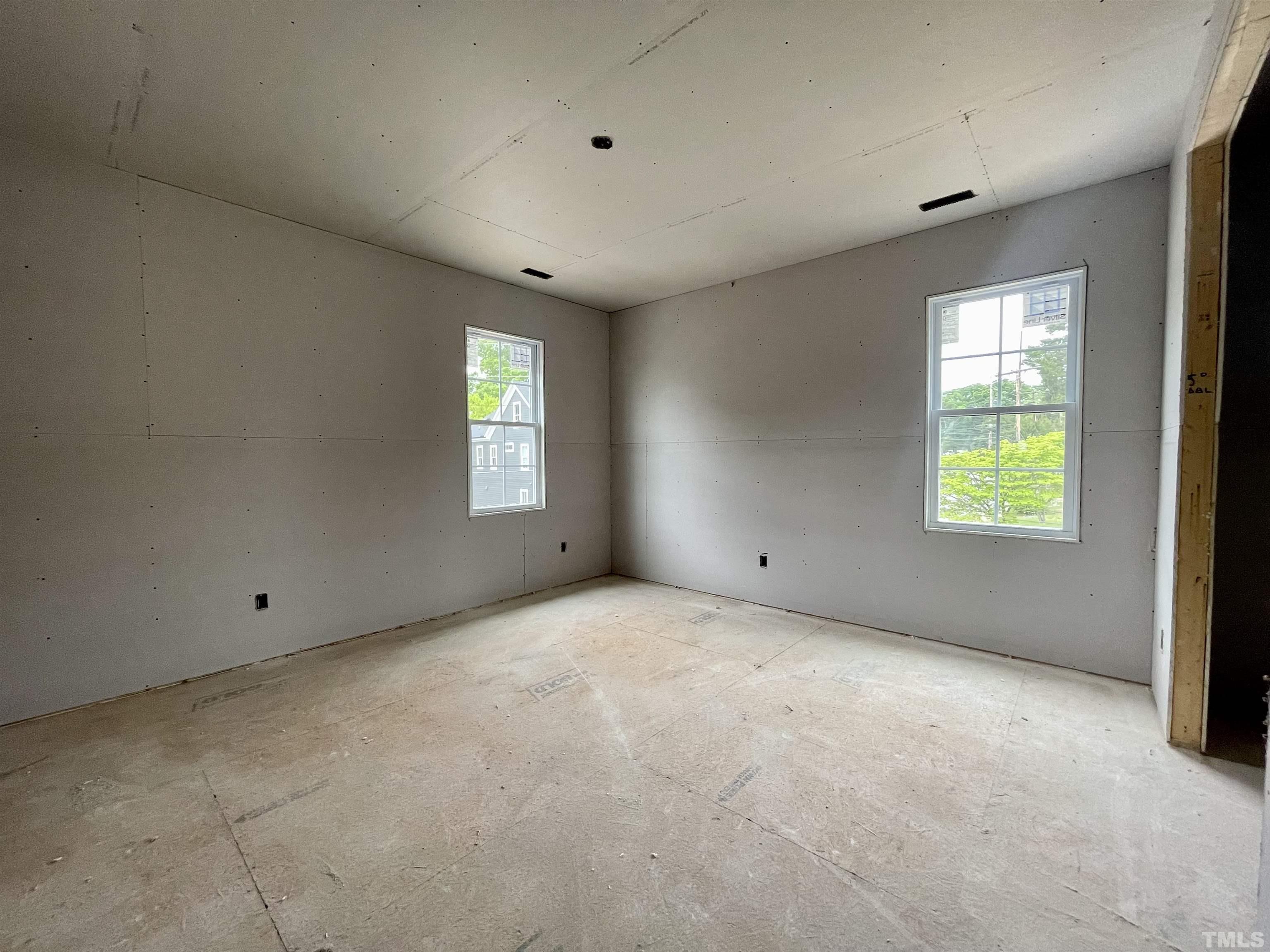 301 Georgetown Road Raleigh, NC 27608 - Photo 45 of 77 a view of an empty room with a window