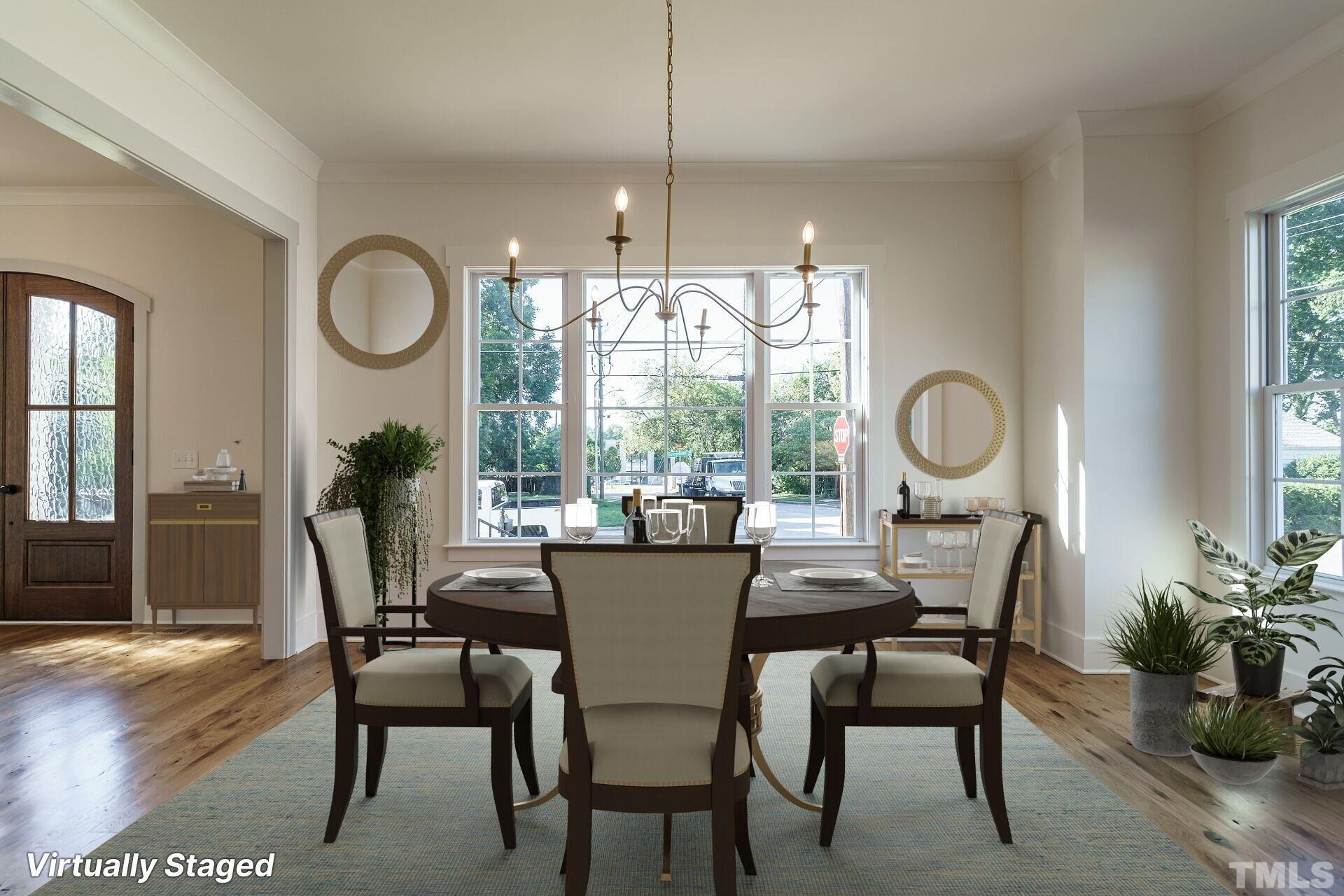 301 Georgetown Road Raleigh, NC 27608 - Photo 72 of 77 a view of a dining room and livingroom with furniture window