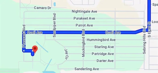 a picture of a book and a white bed