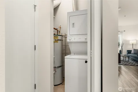 a view of a kitchen from a hallway