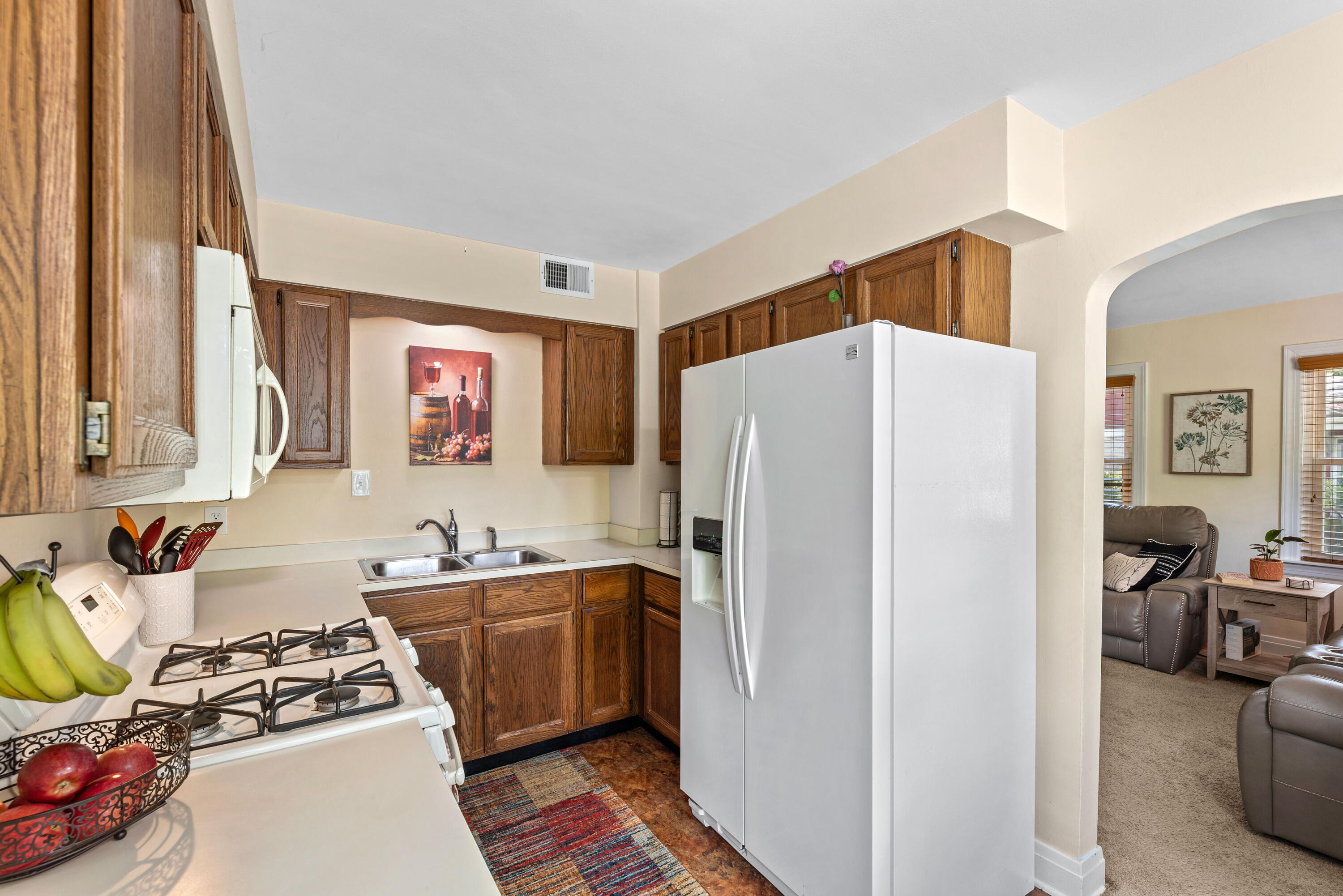 3516 Ridge Road Highland, IN 46322 - Photo 7 of 19 a kitchen with stainless steel appliances a refrigerator and a stove