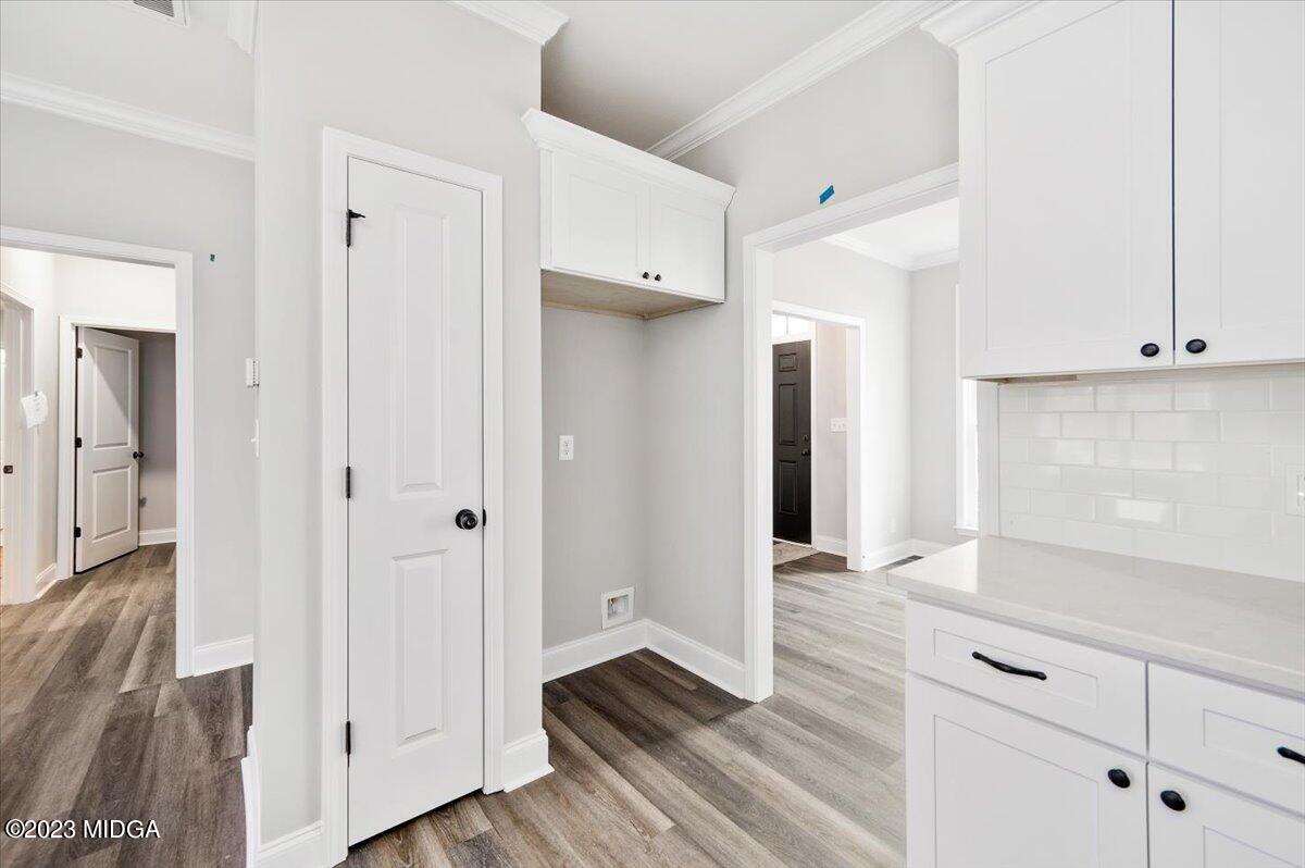 255 High Ridge Court Macon, GA 31220 - Photo 11 of 28 a view of wooden floor and staircase in a kitchen