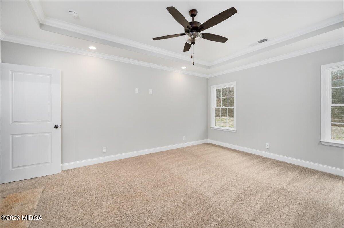 255 High Ridge Court Macon, GA 31220 - Photo 16 of 28 an empty room with a window and a fan