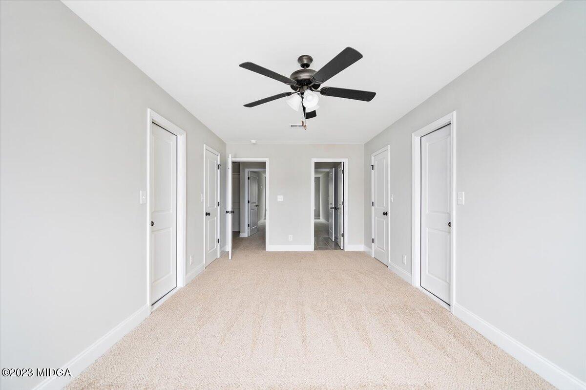 255 High Ridge Court Macon, GA 31220 - Photo 20 of 28 a view of a livingroom with a ceiling fan and window