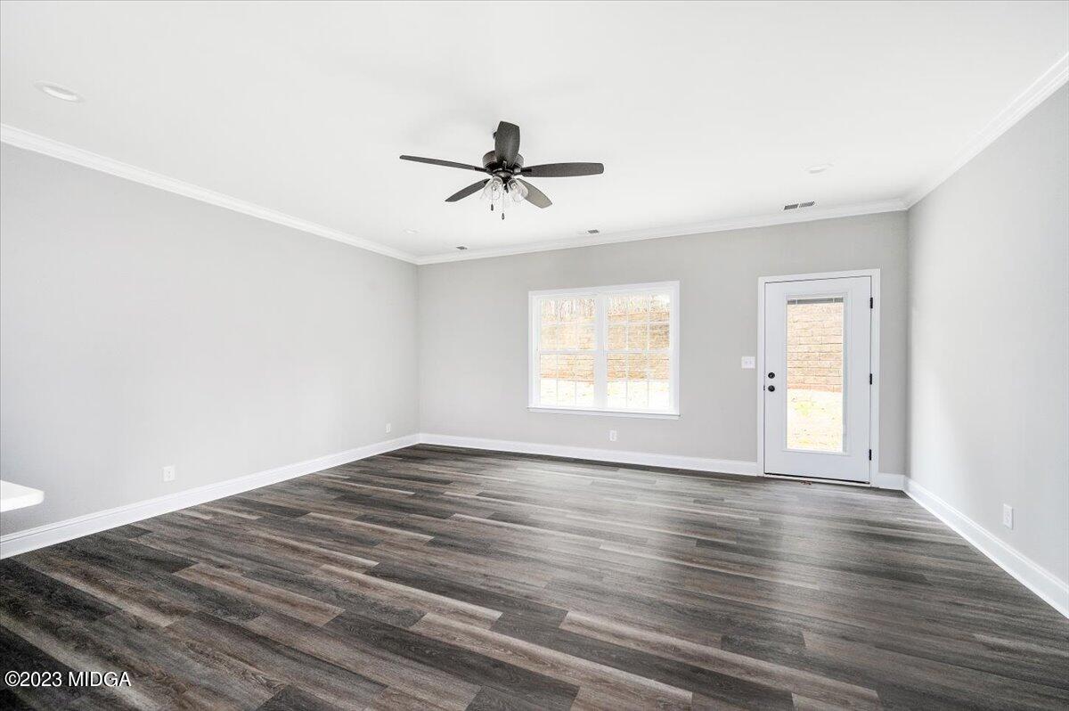 255 High Ridge Court Macon, GA 31220 - Photo 7 of 28 wooden floor in an empty room with a window