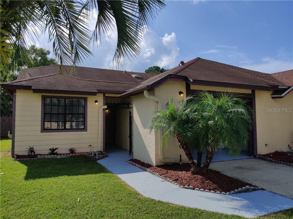 a front view of house with yard