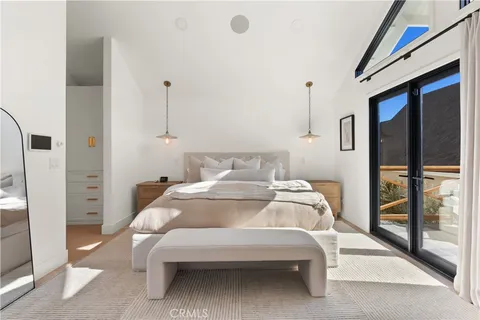 a bathroom with a double vanity sink a toilet and a bathtub