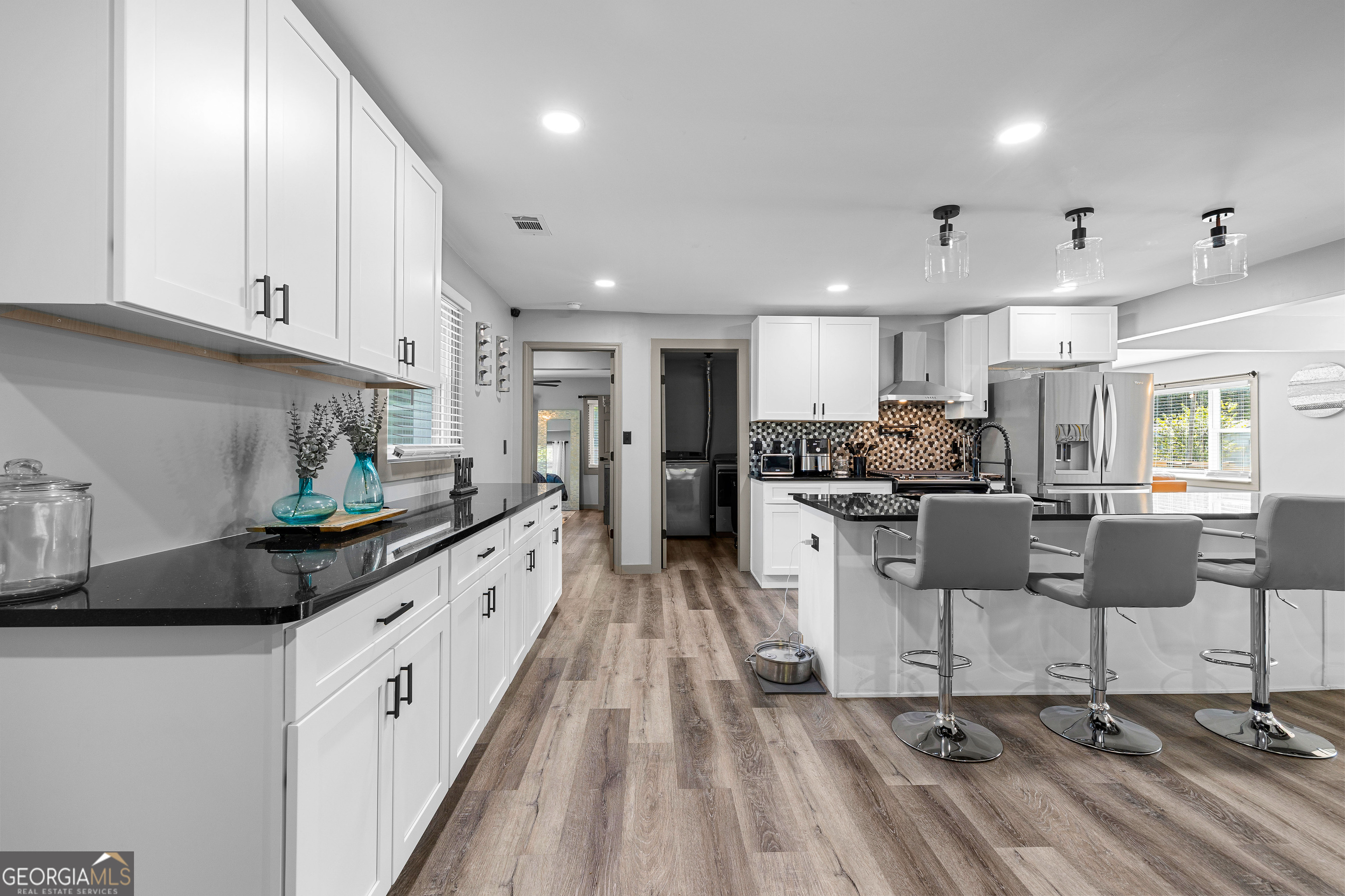 105 Ransby Drive Hogansville, GA 30230 - Photo 18 of 52 a kitchen with refrigerator and cabinets