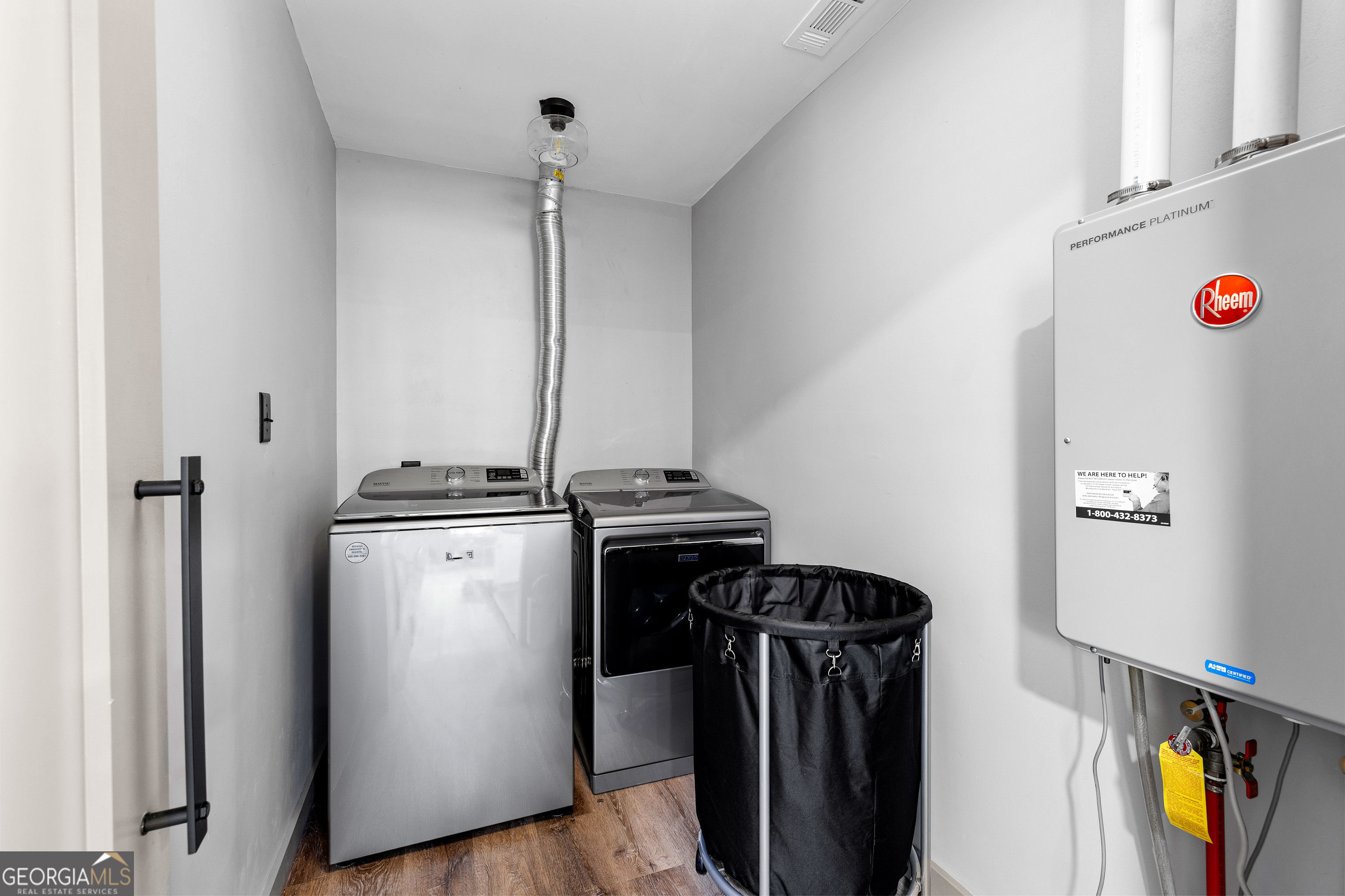 105 Ransby Drive Hogansville, GA 30230 - Photo 19 of 52 a view of a storage and utility room with washer and dryer