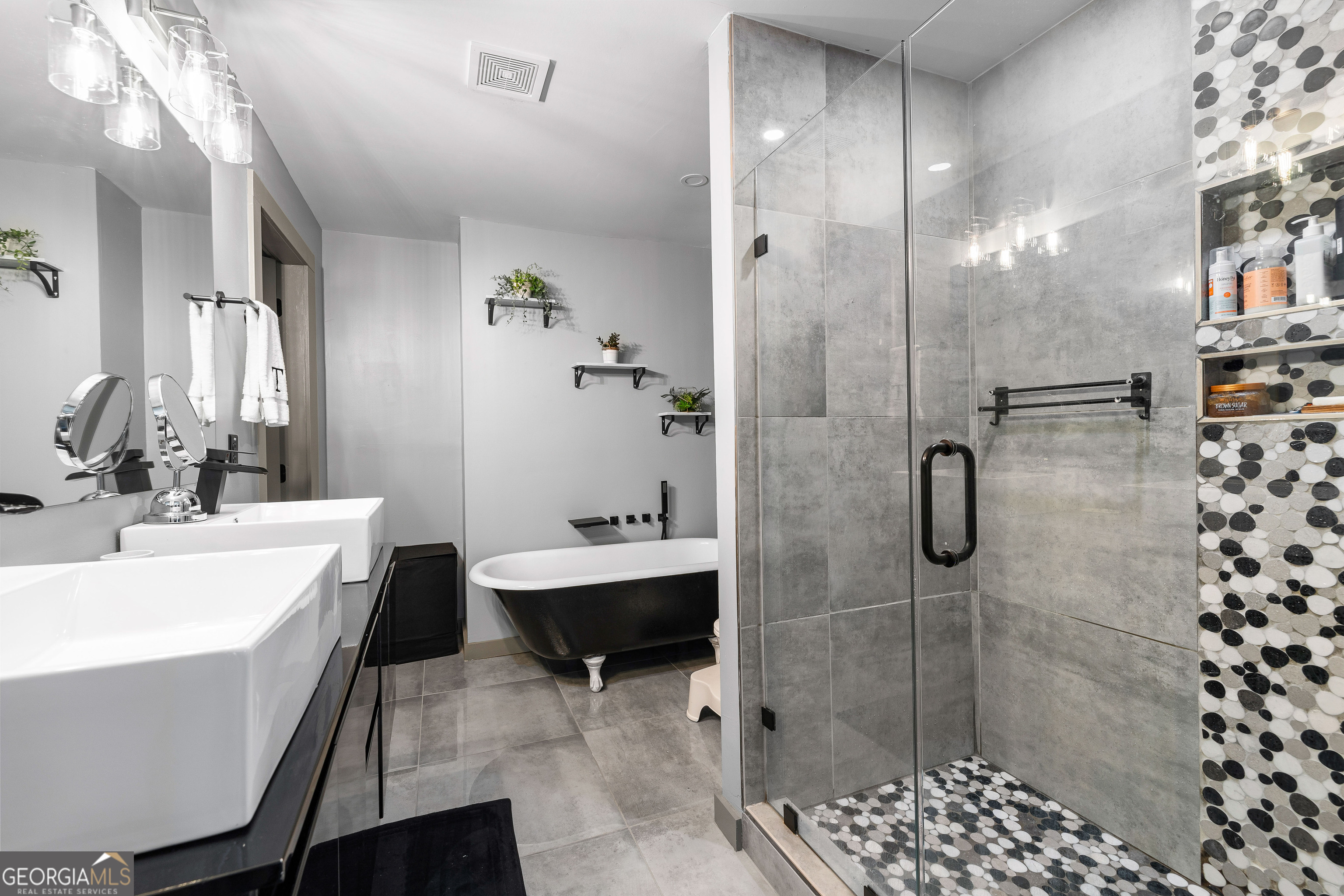 105 Ransby Drive Hogansville, GA 30230 - Photo 23 of 52 a bathroom with a bathtub shower sink vanity and toilet
