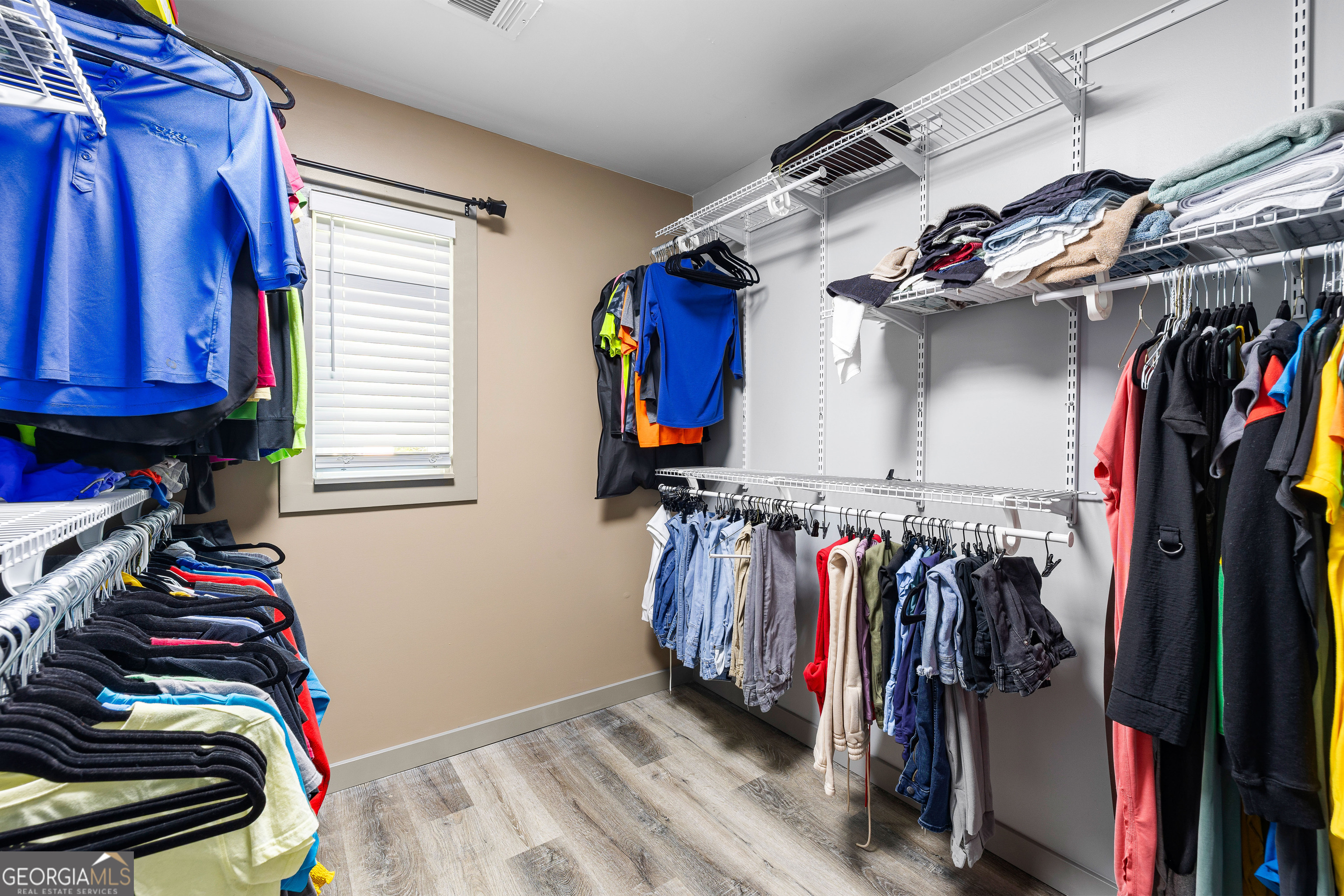 105 Ransby Drive Hogansville, GA 30230 - Photo 26 of 52 a view of walk in closet with clothes