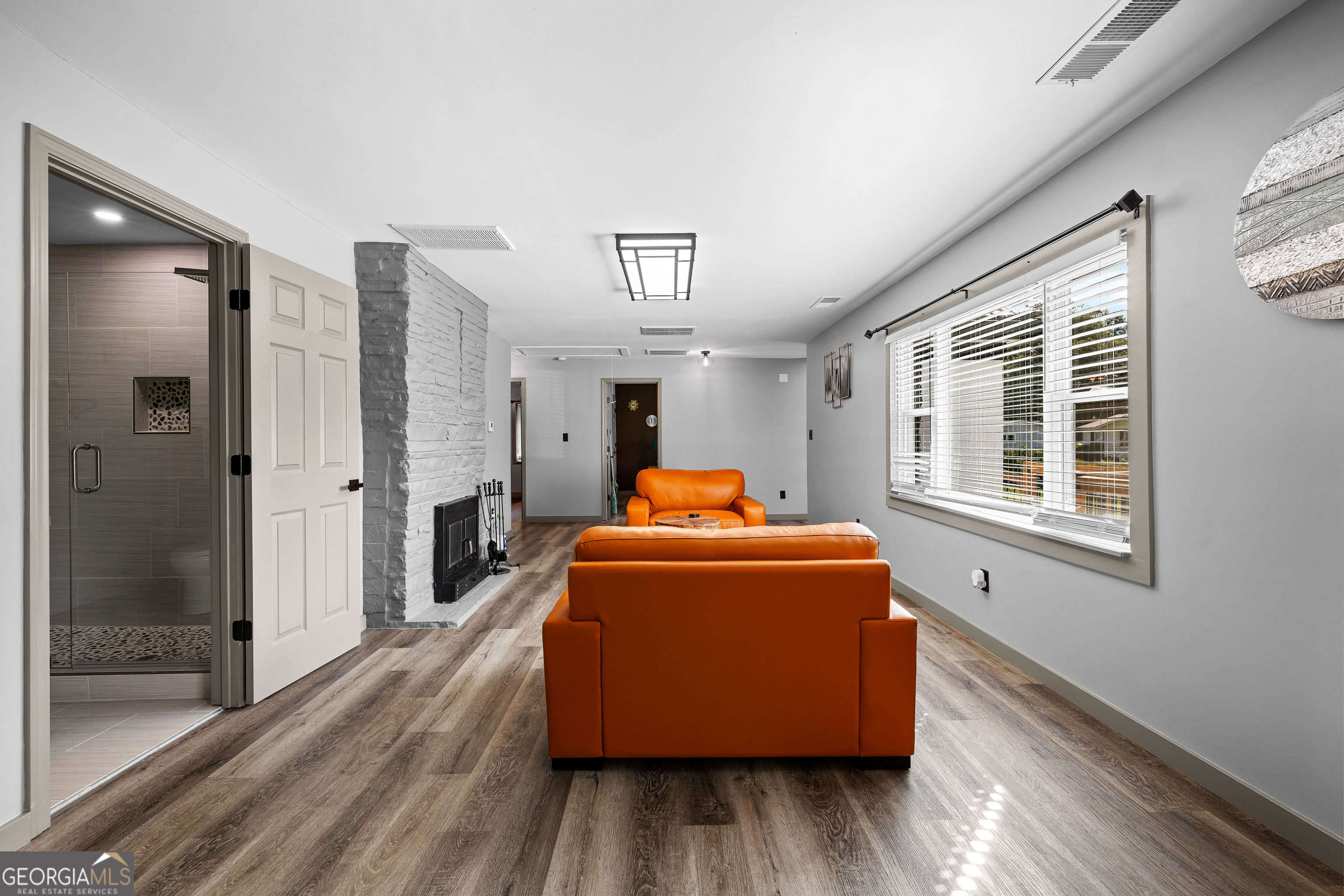 105 Ransby Drive Hogansville, GA 30230 - Photo 7 of 52 a living room with a couch and a table