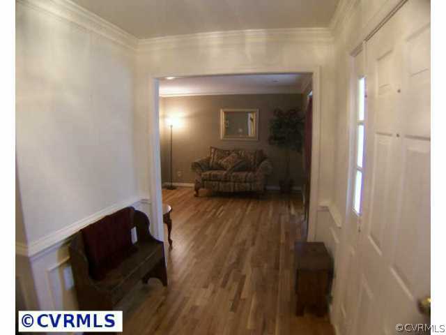 5802 Ridge Point Road Midlothian, VA 23112 - Photo 2 of 10 a view of hallway with wooden floor