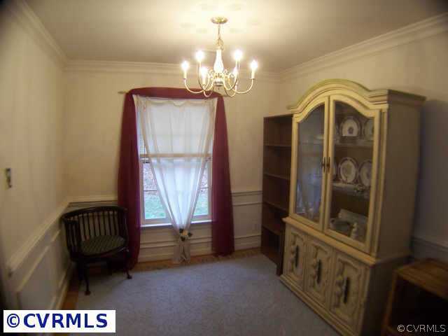5802 Ridge Point Road Midlothian, VA 23112 - Photo 6 of 10 a view of a bedroom with windows