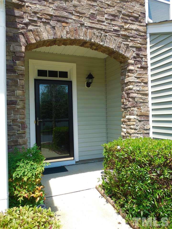 1235 Silver Beach Way Raleigh, NC 27606 - Photo 2 of 30 a couple of potted plants in front of door