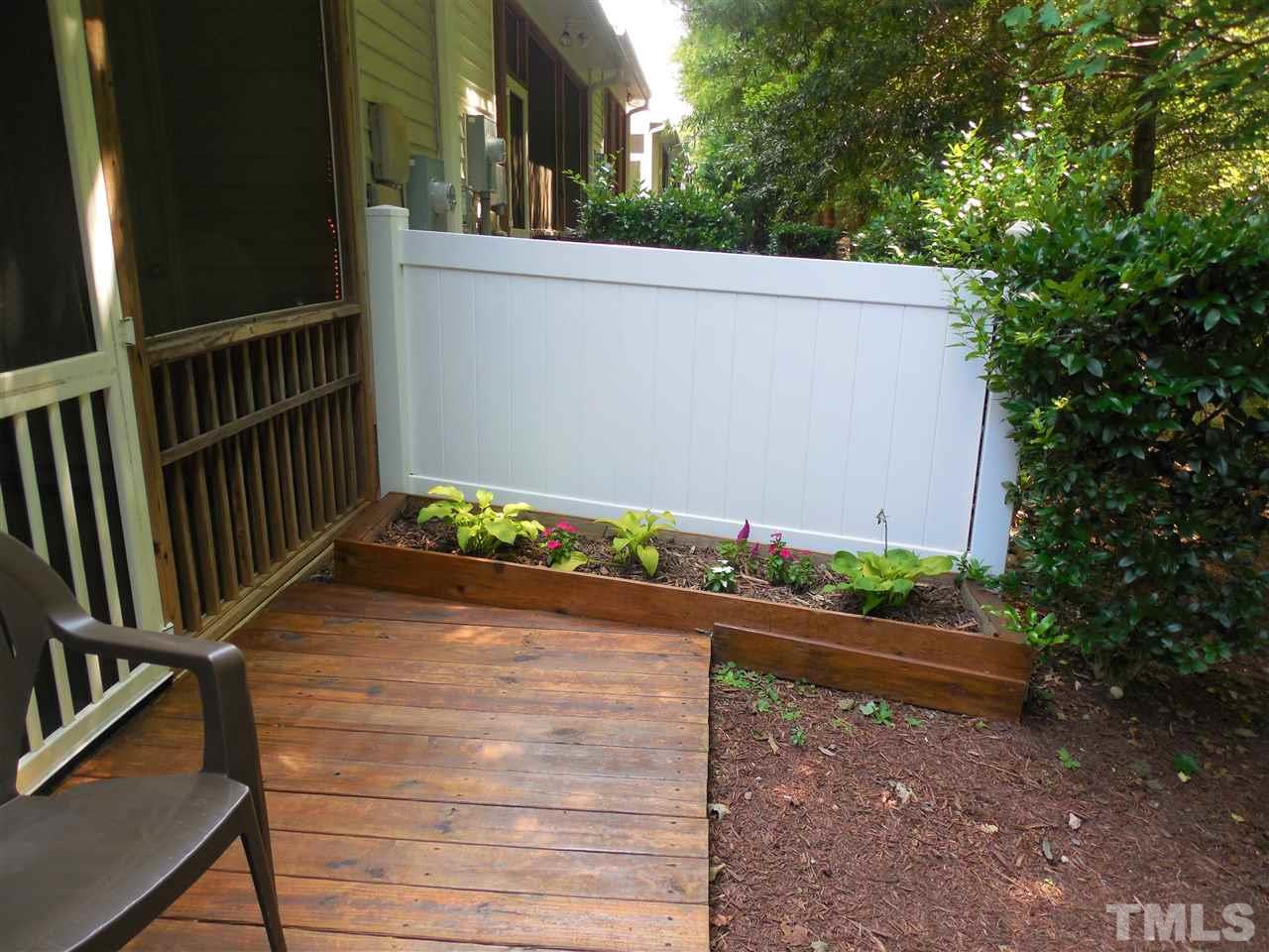 1235 Silver Beach Way Raleigh, NC 27606 - Photo 24 of 30 a view of a pathway of a house and an outdoor space