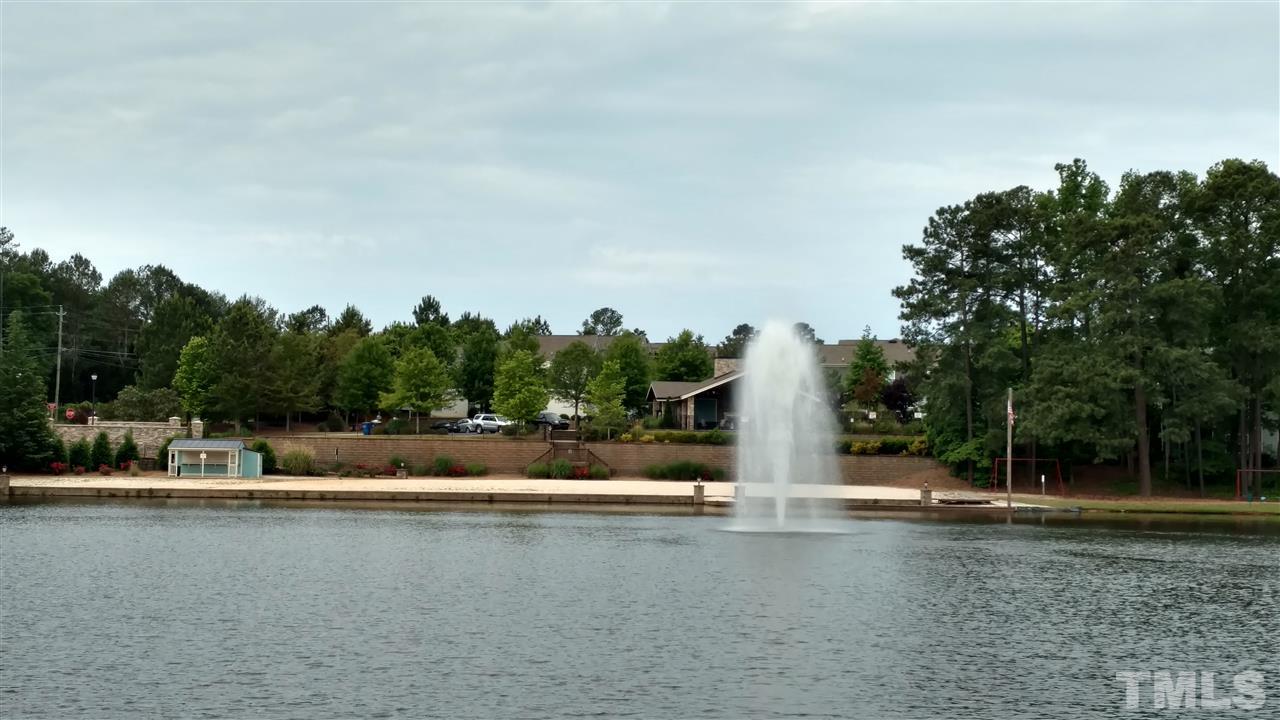 1235 Silver Beach Way Raleigh, NC 27606 - Photo 27 of 30 a view of a lake with houses