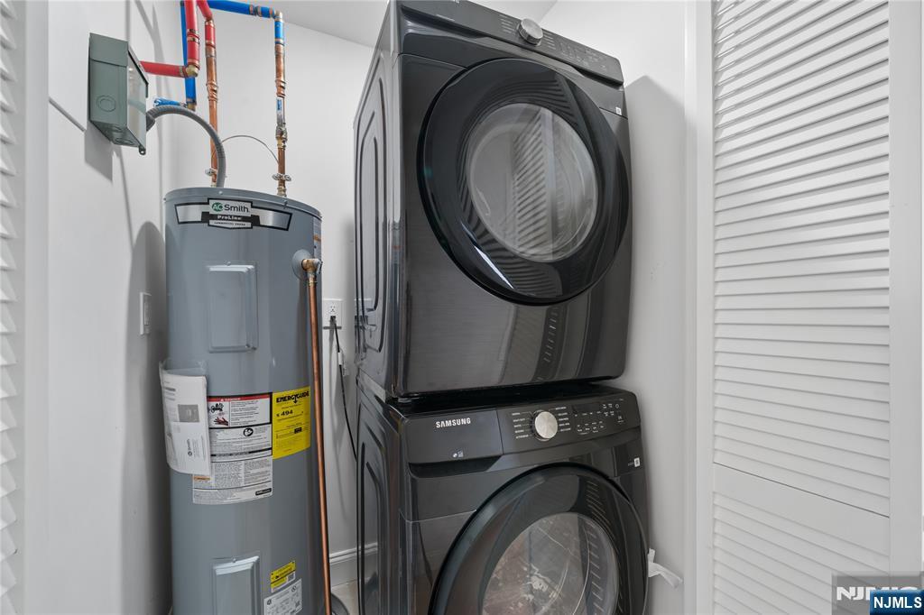 7 Montclair Avenue Paterson, NJ 07503 - Photo 11 of 26 a utility room with dryer and washer