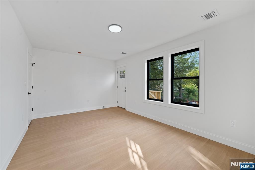 7 Montclair Avenue Paterson, NJ 07503 - Photo 20 of 26 a view of an empty room with a window