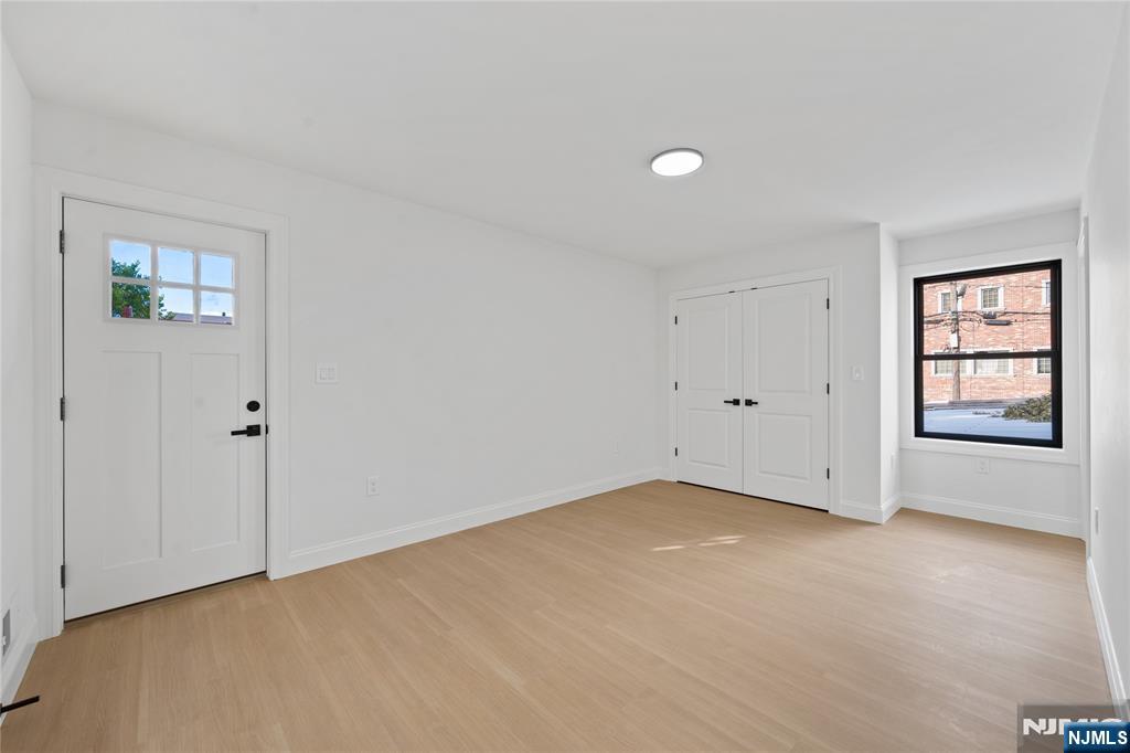 7 Montclair Avenue Paterson, NJ 07503 - Photo 8 of 26 a view of an empty room with a window