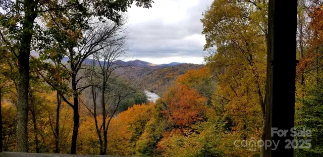a view of mountain view with lots of trees