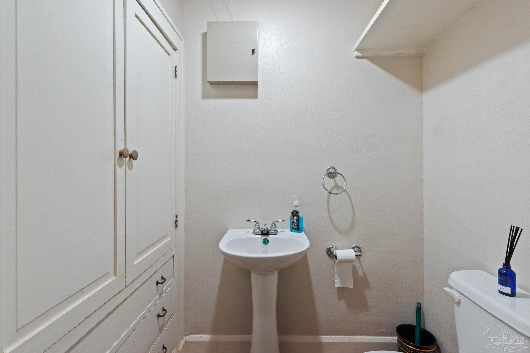 1701 Sowell Road Brewton, AL 36426 - Photo 46 of 72 a bathroom with a sink a toilet and shower
