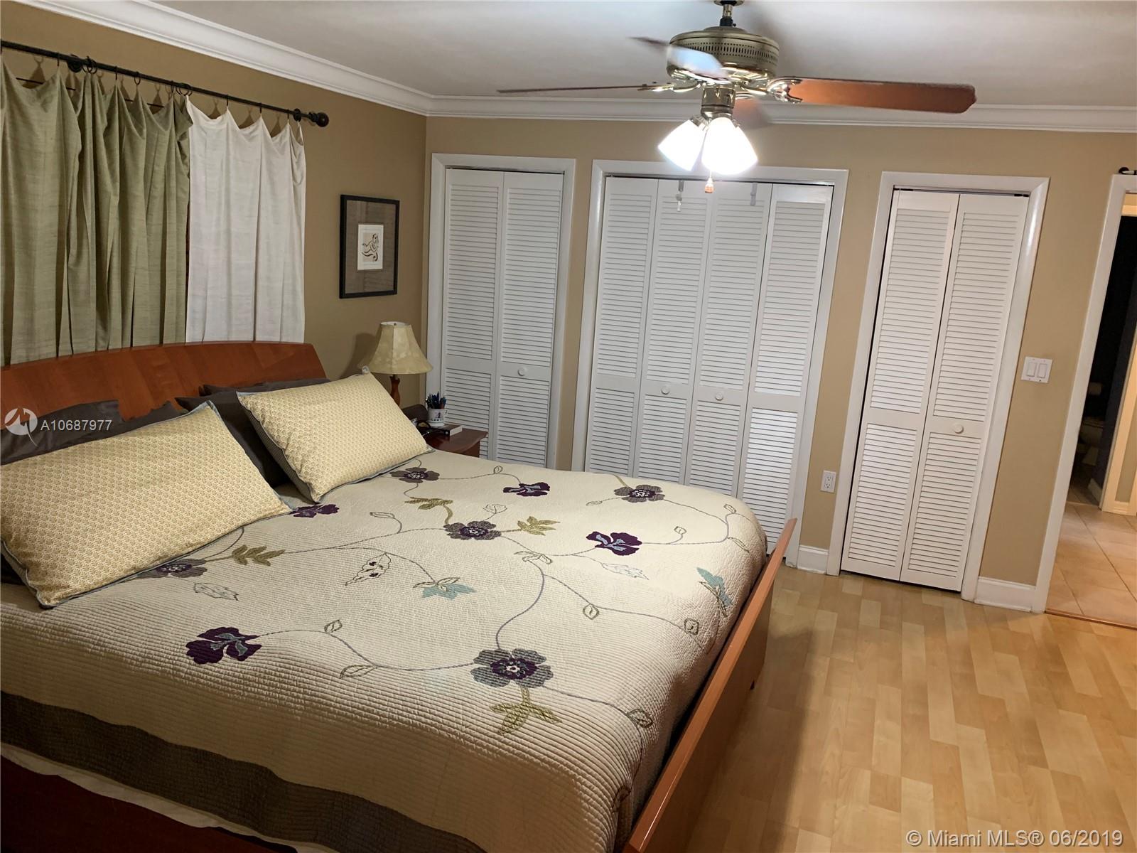 14841 Lewis Road Miami Lakes, FL 33014 - Photo 11 of 32 Master Bedroom