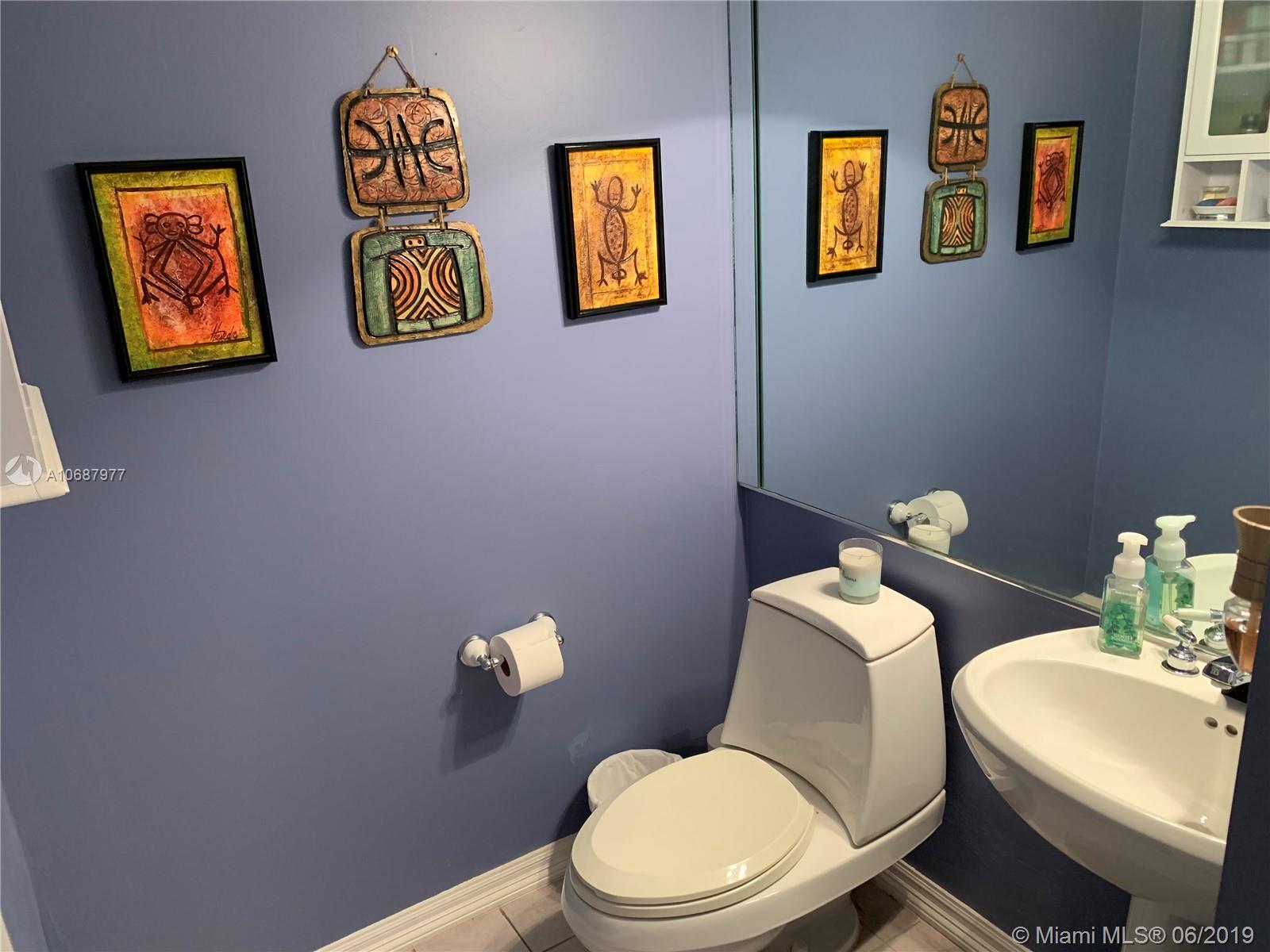 14841 Lewis Road Miami Lakes, FL 33014 - Photo 17 of 32 Half bathroom