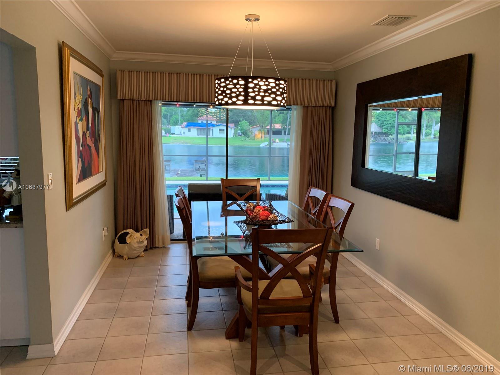 14841 Lewis Road Miami Lakes, FL 33014 - Photo 7 of 32 dining room