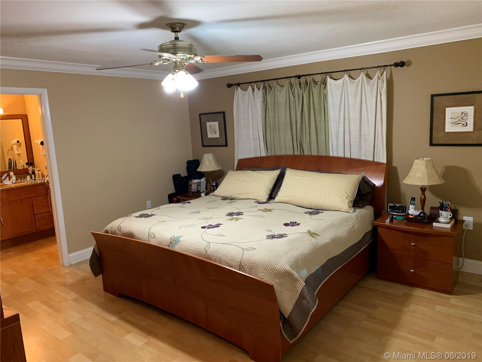 14841 Lewis Road Miami Lakes, FL 33014 - Photo 10 of 32 Master Bedroom