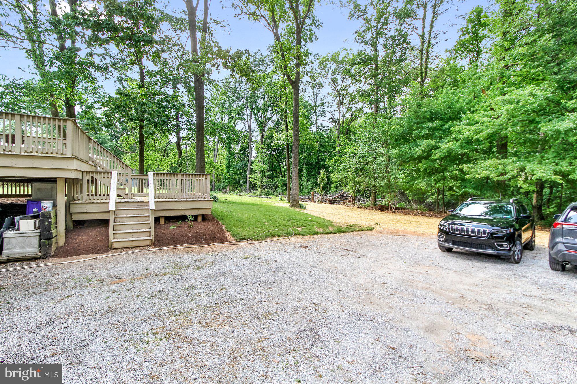 779 Old Commons Road Windsor, PA 17366 - Photo 26 of 28 Driveway and deck, back yard