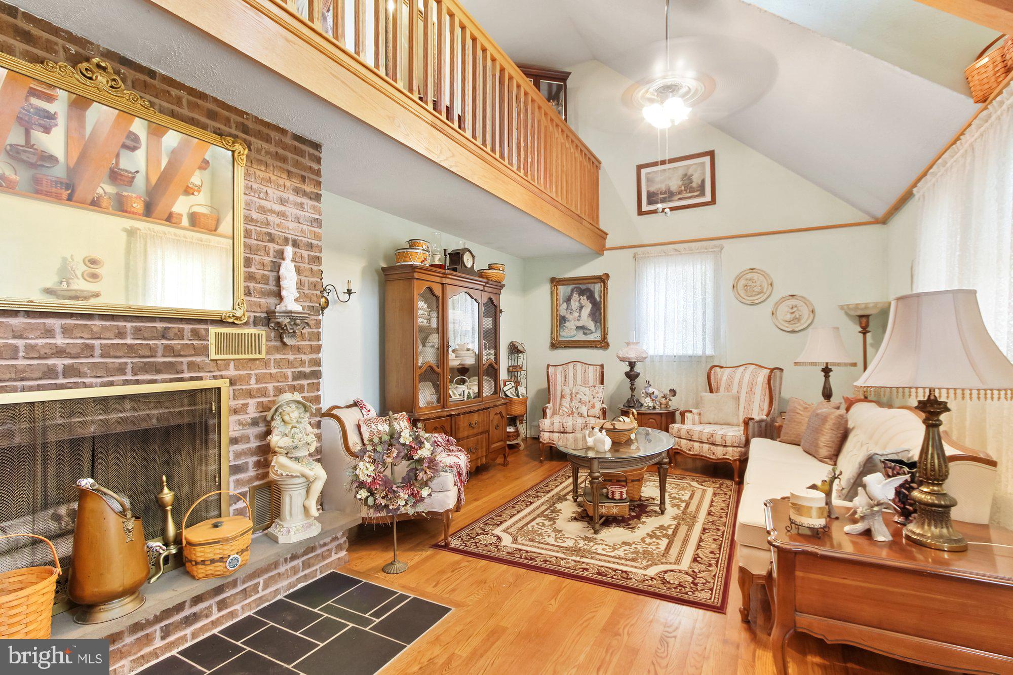 Living room,  vaulted ceiling, hardwood floor