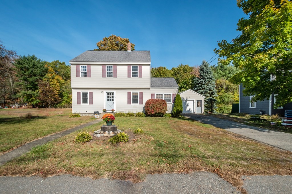56 Ayer Road Shirley, MA 01464 - Photo 1 of 41 a front view of a house with a yard