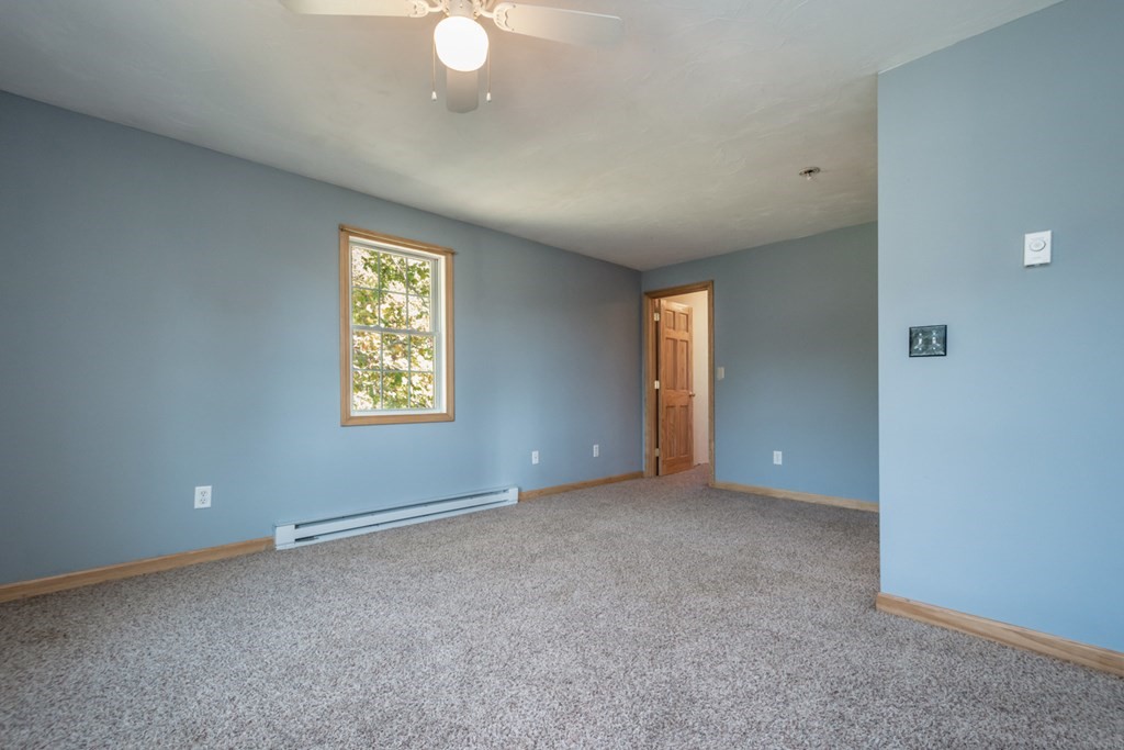 56 Ayer Road Shirley, MA 01464 - Photo 31 of 41 an empty room with windows