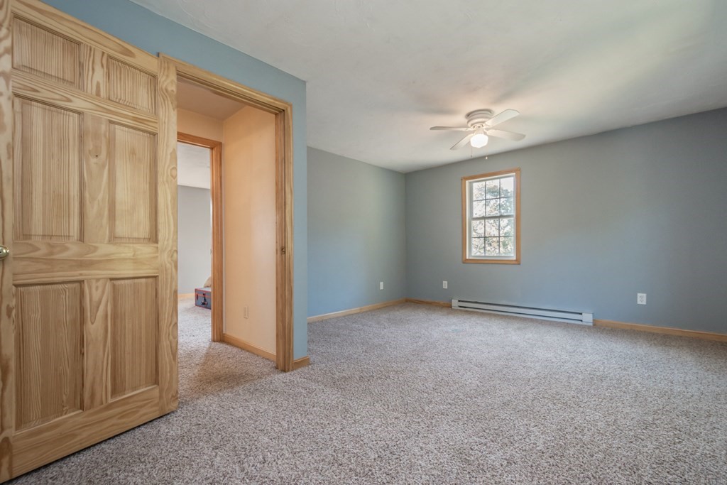 56 Ayer Road Shirley, MA 01464 - Photo 33 of 41 an empty room with windows and closet
