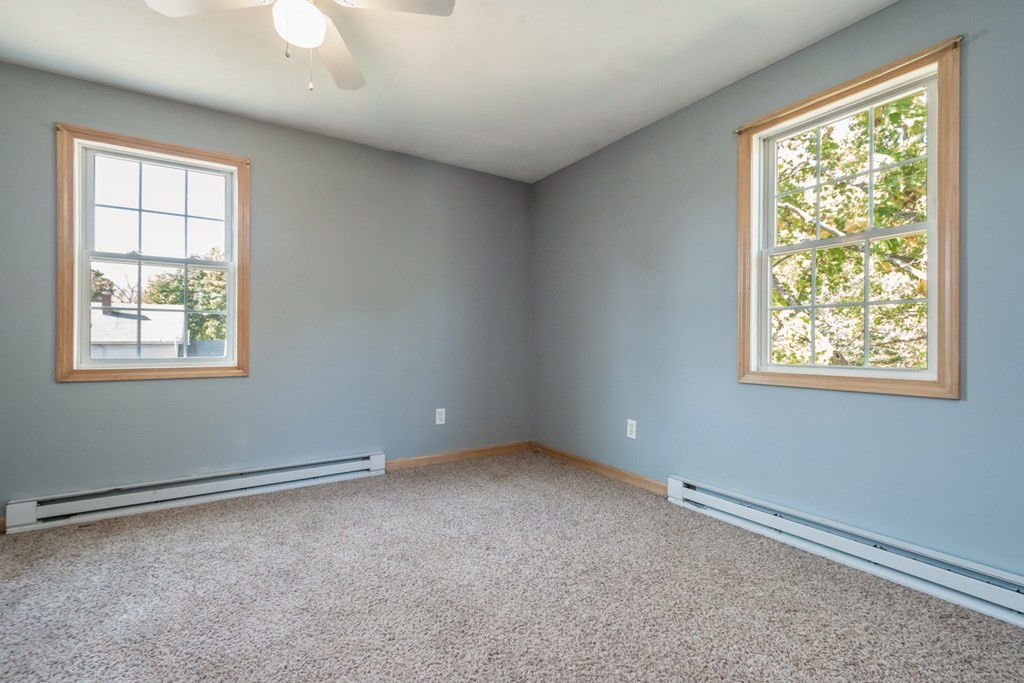 56 Ayer Road Shirley, MA 01464 - Photo 34 of 41 an empty room with windows